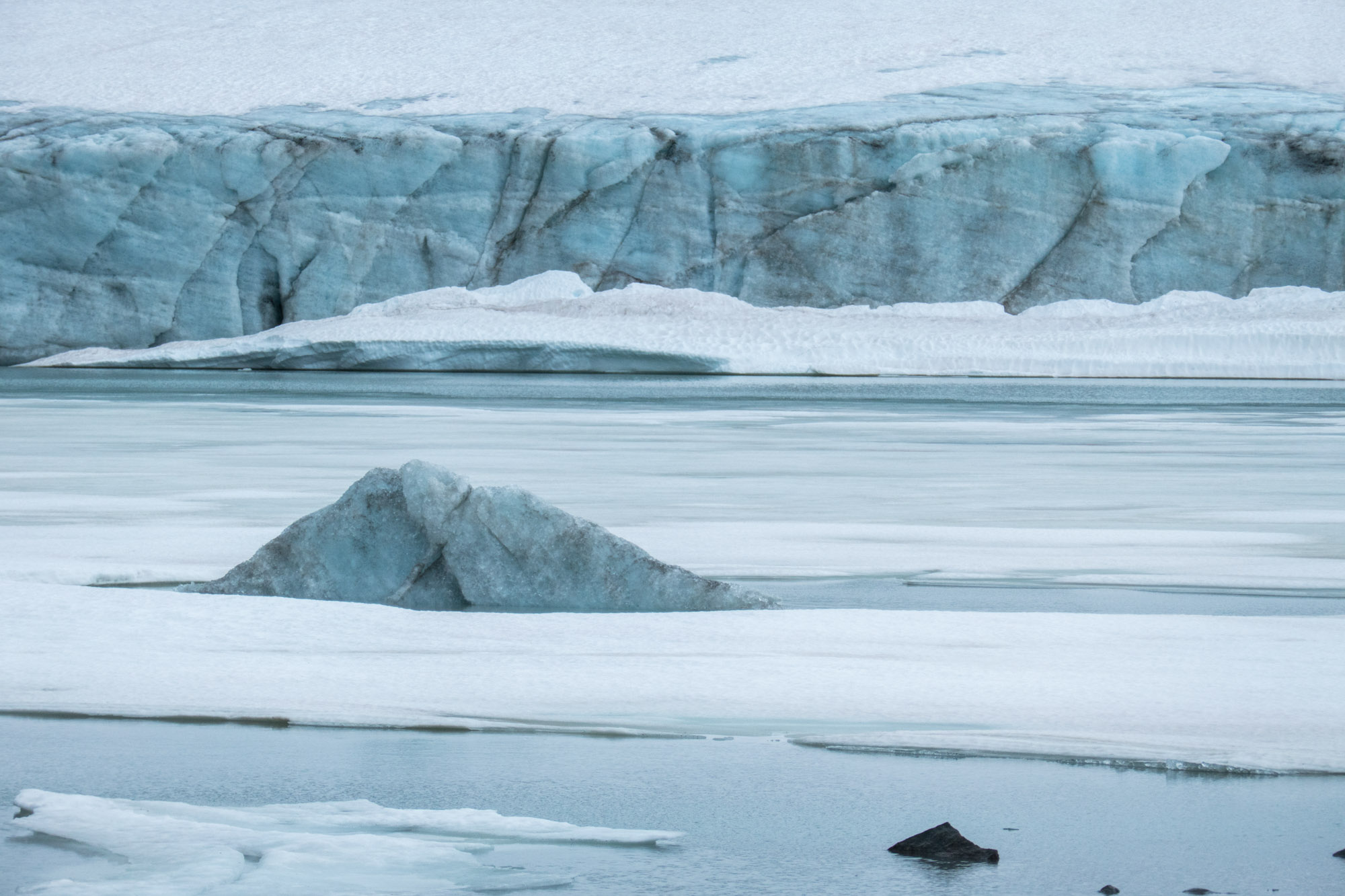 Party frozen lake in front of leirbreen.