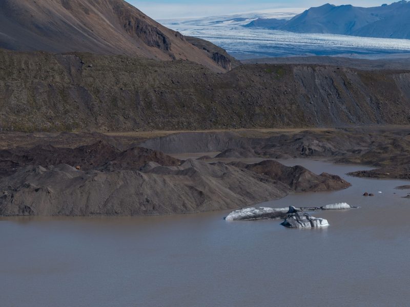 The snout of Kvíárjökull is covered by debris in the north, August 2023.