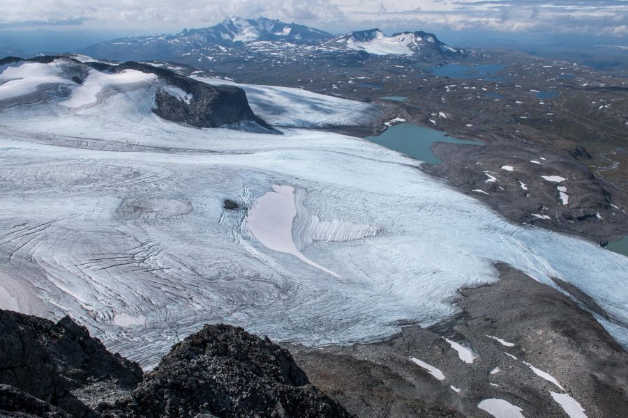 Upper ice field of leirbreen. Fannaråki and Hurrungane in the background.