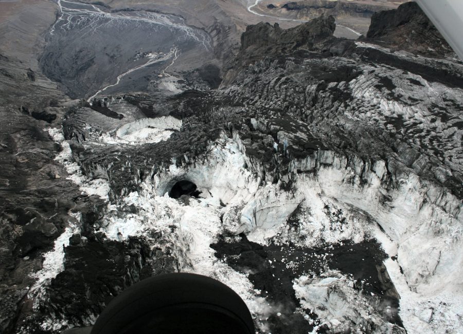 The lava melted a canyon in the Gígjökull up to 100 deep. Photo by Árni Sig via Flickr, from a plane on May 14th 2010.